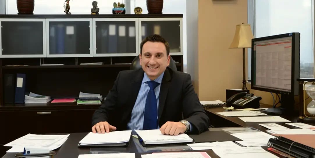 Brampton-Criminal-Lawyer-Charitsis-at-desk Brampton Criminal Lawyer | Nicholas Charitsis